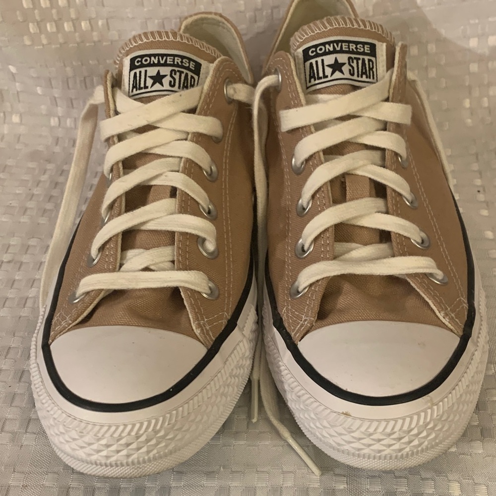 Converse All Star beige canvas sneakers, women’s size 9.5 or men’s size 7.5.